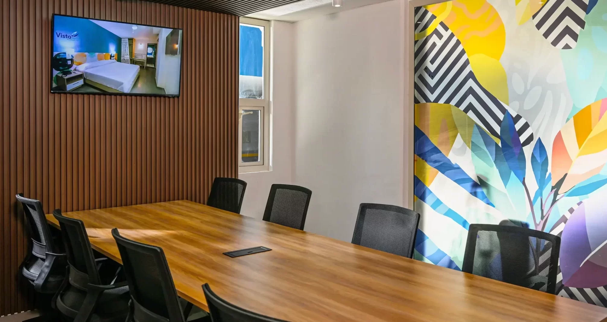 Sala de coworking con
cama incluida